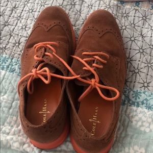 Ladies rust and orange Cole Haan Oxfords.